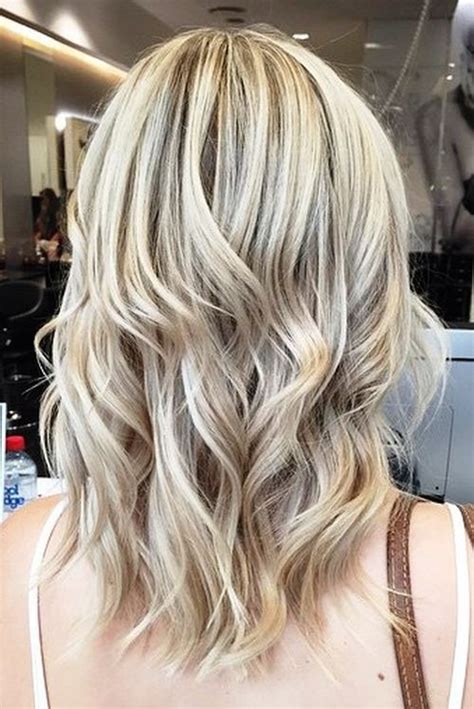 The brown and dark blonde shades come together in a wonderful mixture that shines with ashy tones. 40 Ash Blonde Hair Looks You'll Swoon Over