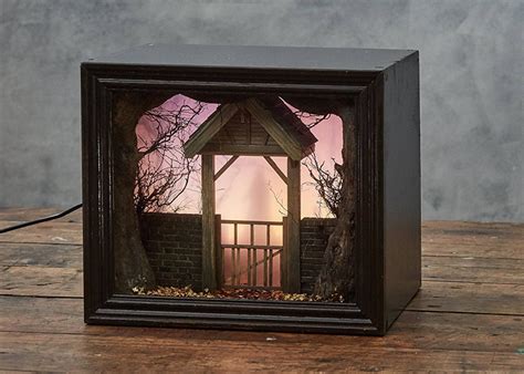 Model Maker Builds Creepy Miniature Scenes Featured Within Shadow Box