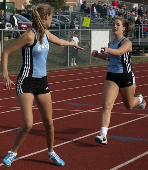 Your handoff relay stock images are ready. The girls relay team executes a baton handoff. Photo by ...