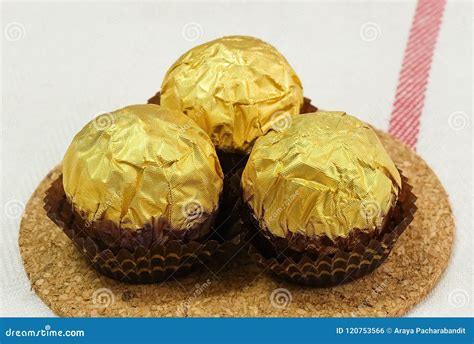 Brown Round Chocolate Candies In Gold Package Stock Photo Image Of