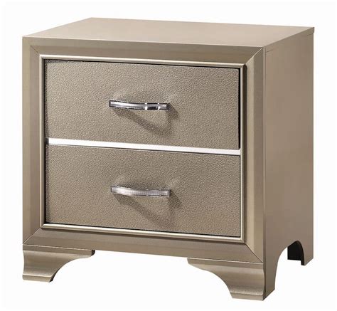 The small space in the back allows you to charge your phone without a bulky cord mess, keeping things tidy. Beaumont Champagne Gold Nightstand | KFROOMS | Gold nightstands