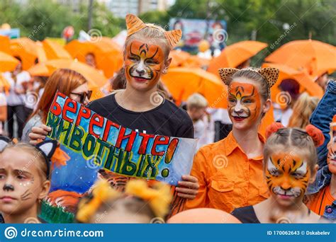 We are full of fun surprises and stock items for any occasion; Participants Of Annual Festive Tiger Day. Kids Hold Tiger ...