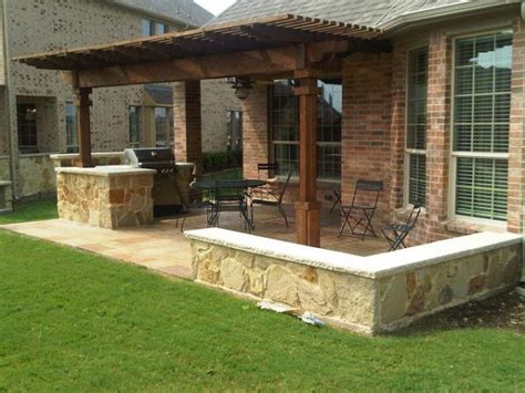 Complete the look with an outdoor fireplace, and you have a warm and welcoming outdoor kitchen and lounge space you will not want to leave. Houston Outdoor Kitchen With Cedar Pergola - Lone Star
