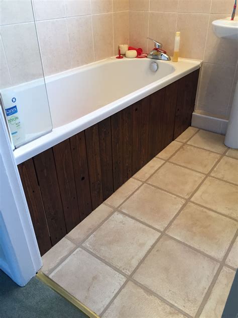 The standard bath panels provide a clean look and are most commonly found in plain white or a wooden finish. Bath panel made from pallet wood | Bath panel, Small ...