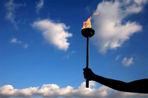 Holding Burning Flaming Torch Stock Photo Download Image Now Istock