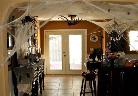 Halloween decorations include pumpkins, skeletons, cobwebs, dim lights and others. Spooky Halloween Kitchen Decorations to Spice Up Your Mood