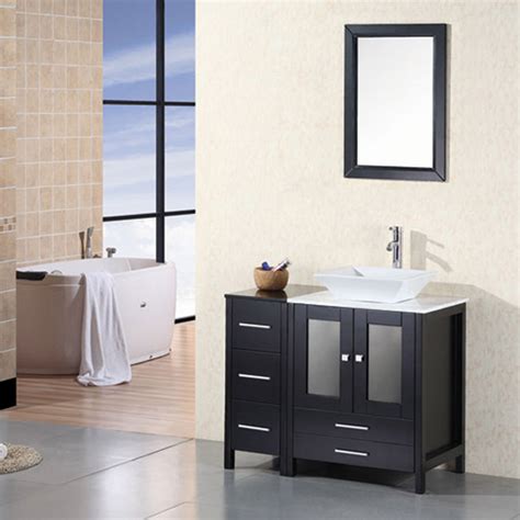 Vessel sinks work well with small bathrooms, especially when you can convert a tiny surface into an impromptu vanity that fits perfectly in a tiny space. Ballard 36" Single Sink Vanity Set | Zuri Furniture
