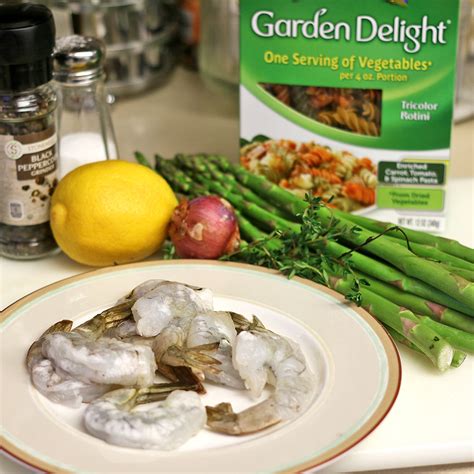 Season the shrimp with old bay seasoning and ground black pepper. Lemon Garlic Shrimp and Asparagus Rotini Pasta