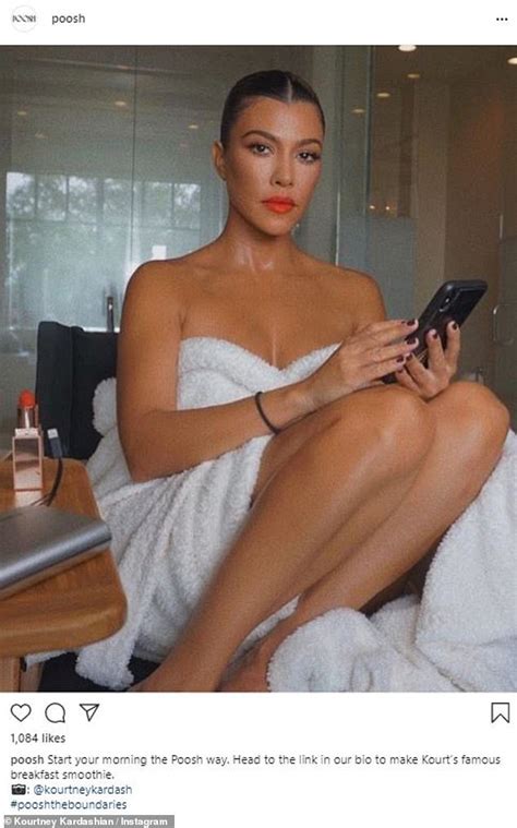 kourtney kardashian highlights her flawless skin and trim figure in a bathrobe as she starts her
