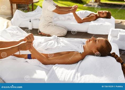Spa Massage Couple Enjoying Relaxing Hand Massage Outdoors Stock Image Image Of Massage