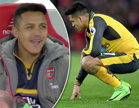 alexis sanchez laughing during arsenal defeat at liverpool football sport uk