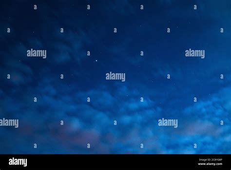 Blue Night Sky With Clouds And Stars Stock Photo Alamy