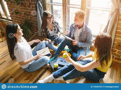 Group of Students Chatting stock image. Image of friends - 143424107