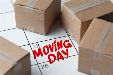 Moving Day On The Calendar Is Written In Red Calendar With A Note With