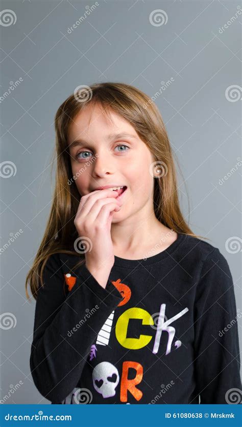 Girl Eating Halloween Candy Stock Photo Image Of Halloween Happy