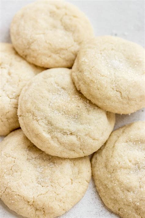 Make perfect cut out sugar cookies with no chill time required! Easy Pillowy Soft Sugar Cookie Recipe - Pretty. Simple. Sweet.