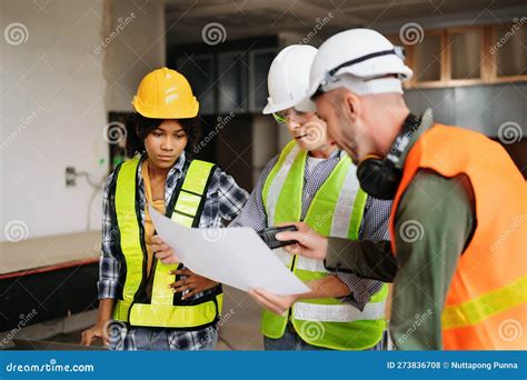 Architect Caucasian Man And Woman Working With Colleagues Mixed Race In