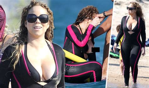 Mariah Carey Suffers Nip Slip After Her Plunging Bikini Struggles To Contain Her Curves