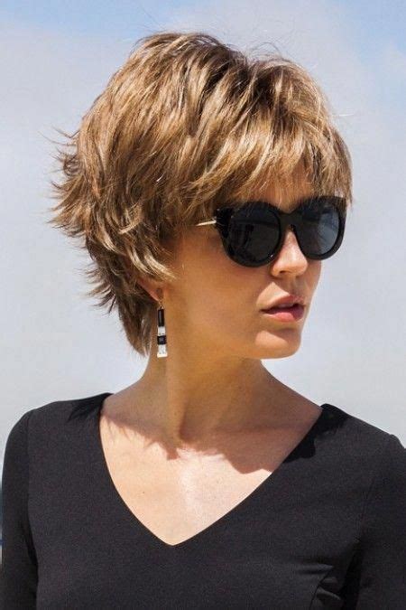 The hairstyle is very cute and of a medium length, i.e., up to the neck. Pin on short hairstyles for thick hair ideas