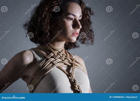 Woman In Art Bandage Tying With Rope Shibari Style Sex Game Bdsm And Sexual Trade Slavery