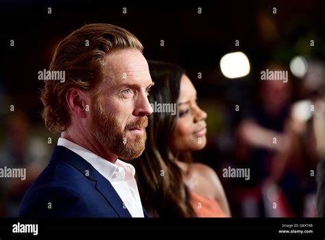Damian Lewis Left And Naomie Harris Attending The Uk Gala Premiere Of Our Kind Of Traitor In