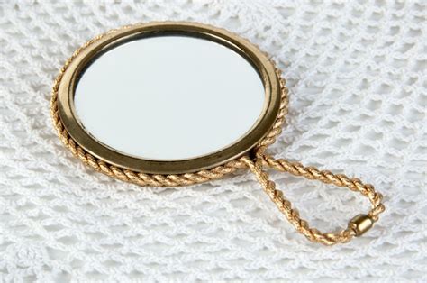 Premium Photo Vintage Brass Hand Mirror