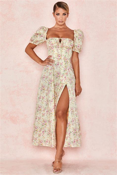Pick up a bargain midi dress from our great collection at everything5pounds.com. LEMON FLORAL PUFF SLEEVE MIDI SUNDRESS - House of CB ...