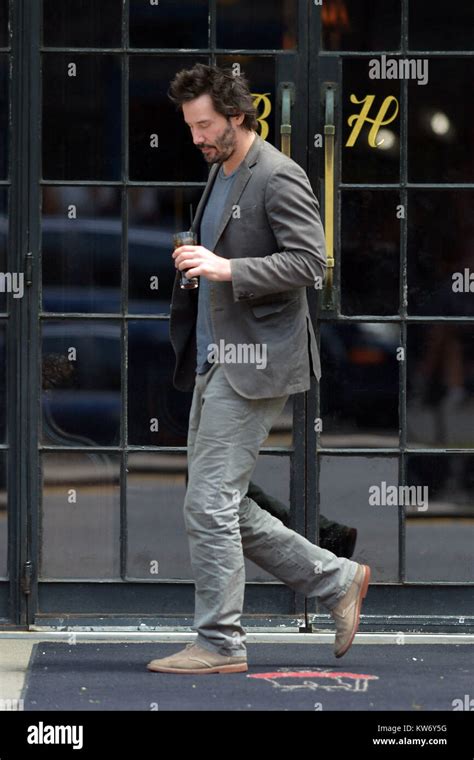 New York Ny May 30 Keanu Reeves Walking With A Drink In Downtown
