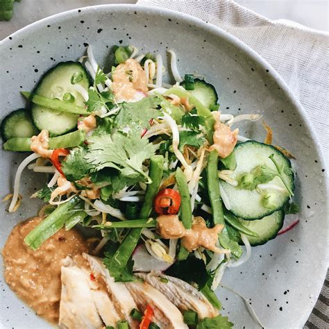 Bring poaching liquid to a boil; COCONUT POACHED CHICKEN SALAD WITH THAI PEANUT DRESSING ...