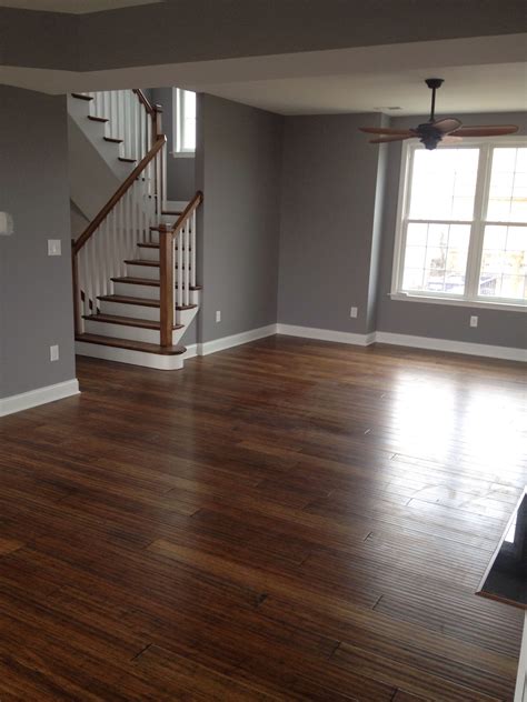 Installing hardwood floors in your home with the experienced, licensed installers at your local home depot is the easiest way to replace old wood flooring. Love the dark bamboo floors and pewter walls. … | Living ...