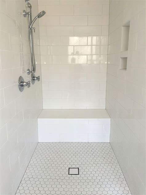 Interestingly, porcelain tile bathroom flooring is almost too waterproof. Large White Subway Tile Shower Surround with Hexagon Floor ...