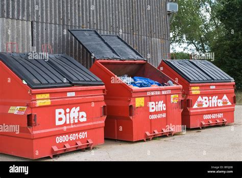 Three Large Red Commercial Waste Bins Industrial Waste Stock Photo Alamy