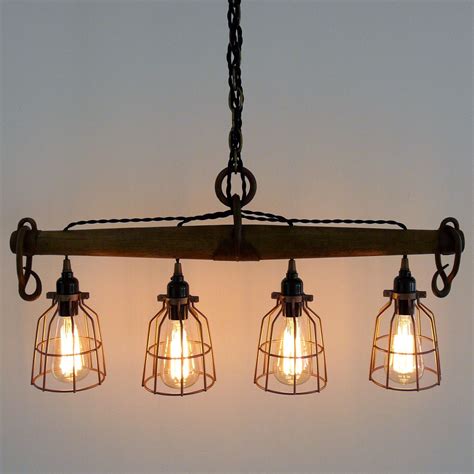 Rustic country chandelier lighting fixtures that clearance has to offer are cheap in prices. Rustic Industrial Yoke Chandelier, Modern Industrial ...