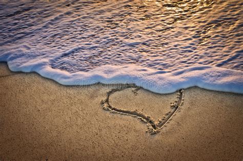 A Heart On The Beach At Sunset Stock Photo Image Of Draw Love 71644306