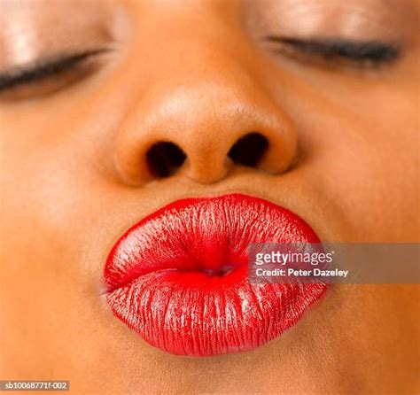 Red Lips Blowing Kiss Photos Et Images De Collection Getty Images