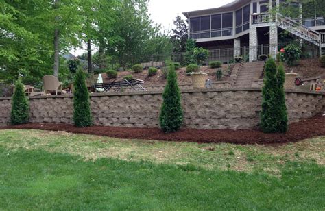 If a brick in a mortared wall comes loose, remove it and chip away the old mortar. Retaining Walls - Growing Edge Landscaping