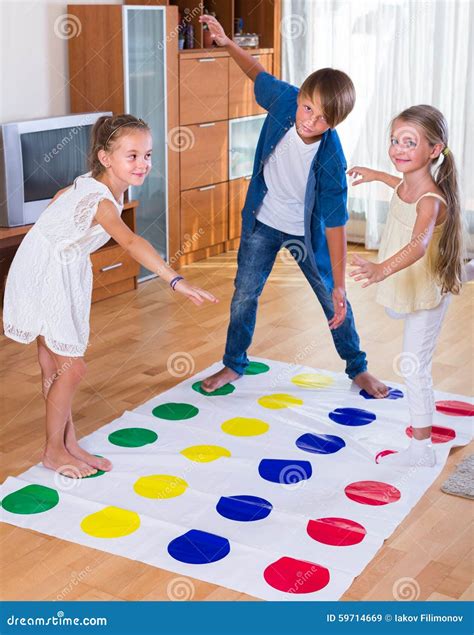 Happy Children Playing At Twister Stock Photo Image 59714669