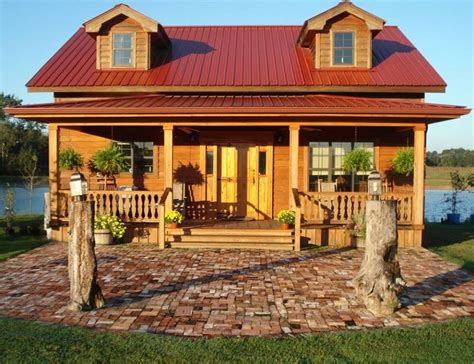 For more information, visit www.metalroofing.org. log homes with red metal roof pictures | Cottage exterior ...