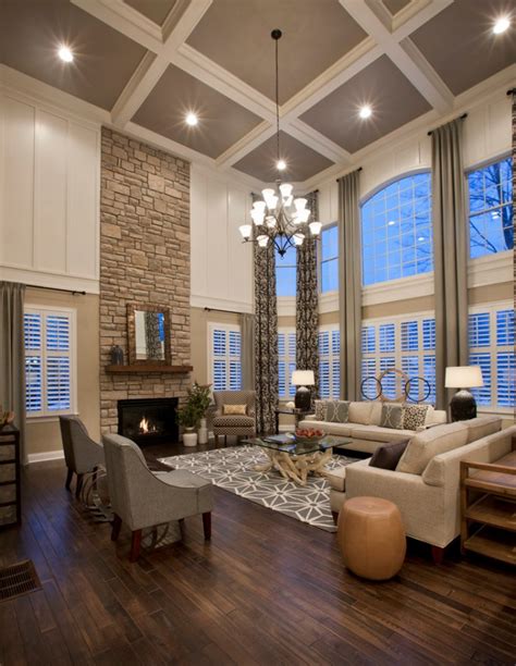 The blades of the ceiling fan offer more of a traditional look. 15 Living Rooms With Coffered Ceiling Designs