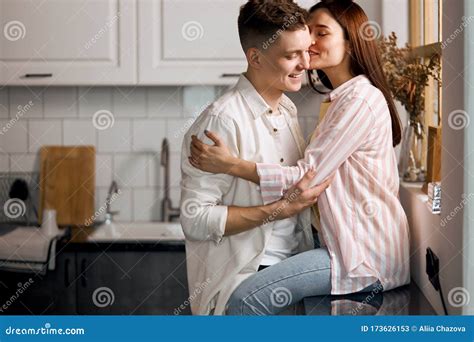 Smiling Pretty Girl Kissing Her Husband On His Cheek Stock Image Image Of Female Cooking