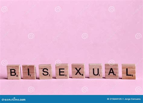 bisexual words represented by wooden letter tiles isolated on colour background with copy space
