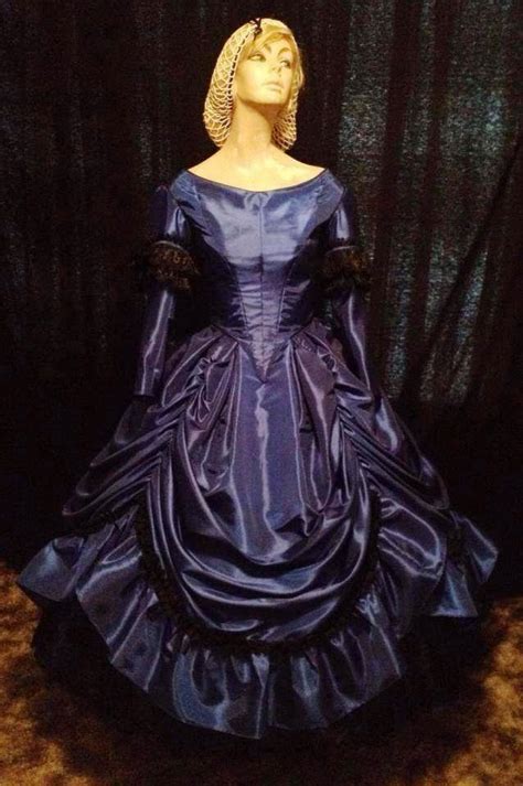 Center front was cut on the straight, and i replaced the single dart with two fairly curved darts. 1860's Ball Gowns