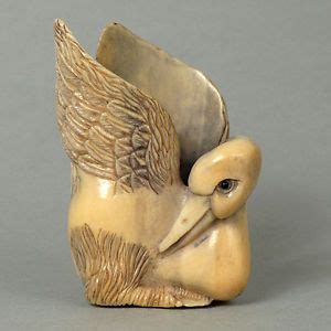 Any netsuke that has moving parts or hidden surprises. Pin on Netsuke