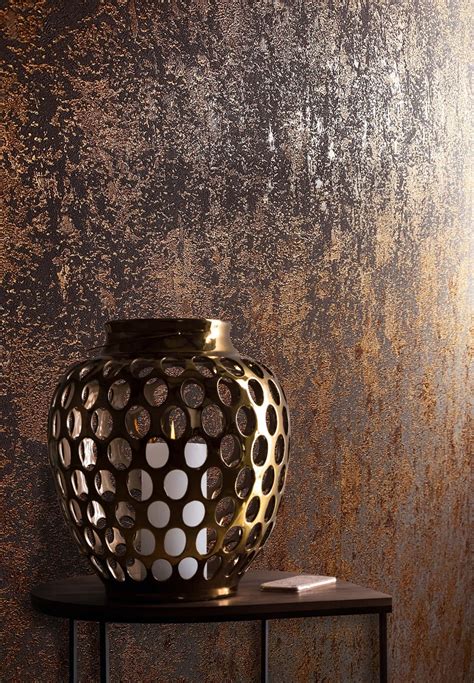 Download Caption Intricate Bronze Vase Display Wallpaper