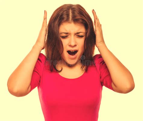 Brunette Woman Covering Her Ears With Her Hands Screaming Opened Stock