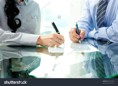 Two Business People Signing Document Stock Photo 96276560 Shutterstock
