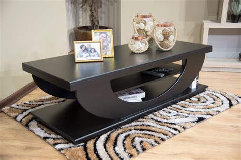 A solid wood coffee table can work well in both traditional and contemporary homes whereas a dark wood coffee table is best suited in a more classic setting. Sable Coffee Table - Mr Online Furniture