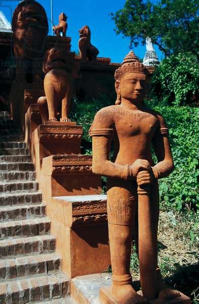 Image Of Terracotta Statues Lining Sides Of Steps Of Wat Phnom Phnom
