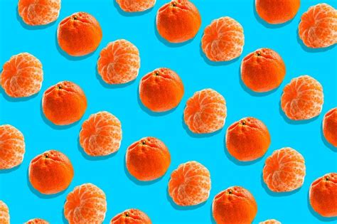 Premium Photo Isometric Tangerines On A Blue Background