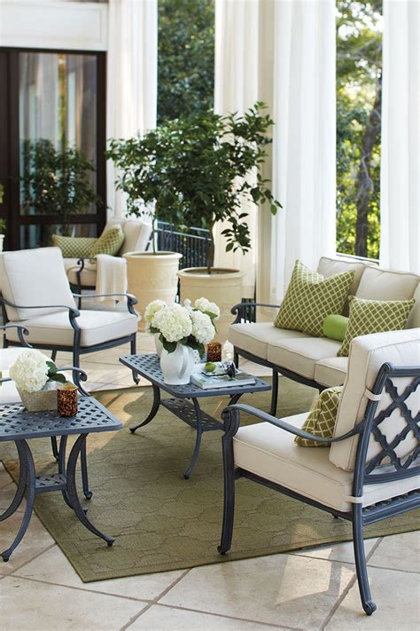 Create Two Distinct Seating Areas On A Porch Thats Longer Than It Is